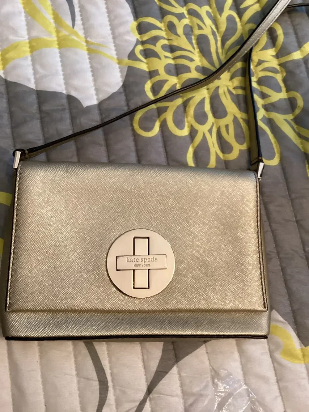 Kate Spade New York Newbury Lane Sally Crossbody bag in metallic gold